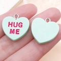 Mint green resin heart pendant with red HUG ME engraving and silver metal ring loop - Mint Green Hug Me (SN16420)