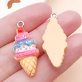 Resin strawberry ice cream cone pendant DIY charm with pink and blue cream layers - Yellow Style