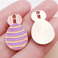 Easter bunny egg charm in purple and yellow stripes for DIY jewelry making - Purple Enamel Striped Bunny Egg