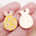 Easter bunny egg alloy pendant with yellow oil drop finish and small flower details - Yellow Enamel Flower Bunny Egg