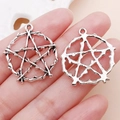 Ciondoli a stella in lega d'argento antico per gioielli fai da te tenuti in mano - Tondo Spinoso Traforato Pentagramma (28x25.5x3mm)