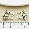 Macro view of vintage silver shooting star alloy charms for DIY jewelry making - Antique Silver Rainbow Star Meteor Hollow Border (15645)