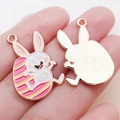 Cartoon Easter bunny pendant in a pink and yellow eggshell charm for jewelry making - Pink Enamel Striped Bunny Egg