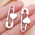 Pair of antique silver heart safety pin charms for DIY jewelry making and crafts - Sewing Machine Heart Pin (22269)