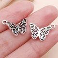 Schmetterling Anhänger aus Altsilber im Vintage-Look mit Durchbruchmuster für DIY Schmuck - Hohlschleife (24723)