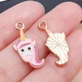 Colgantes de unicornio en esmalte rosa y blanco con acabado dorado para bisutería DIY - Unicornio Esmaltado Rosa (25167)