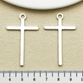 Macro shot of silver cross pendant showing dimensions on a ruler for jewelry making - Antique Silver Cross (2380) / 27x45mm