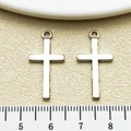 Macro view of silver hollow cross pendants with scale ruler showing exact dimensions - Antique Silver Cross (7916) / 13x27mm