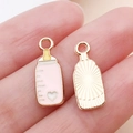 Rosa und gelbe Babyflasche Anhänger aus Emaille für DIY Schmuck und Armbänder - Emaille Skala Babyflasche / Rosa