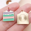 Zinc alloy cake pendant with colorful enamel drips and a gold-tone metallic back - Green Enamel Multicolor Cake (24682)