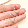 Colgantes de rombo hueco en acero inoxidable plateado sostenidos a mano para joyería DIY - Estilo Rombo Mediano (T1843)