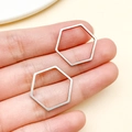 Colgante geométrico hexagonal de acero inoxidable plateado para joyería artesanal - Estilo Hexagonal Mediano (T1885)