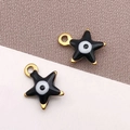Colgantes de estrella con ojo turco en esmalte blanco y negro con acabado dorado - Ojo Turco Estrella Negra / 9x10mm
