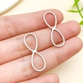 Ciondoli infiniti in acciaio inossidabile oro rosa per creazione di gioielli - Stile Simbolo Infinito (T1806)