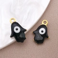 Colgante Mano de Fátima en esmalte negro y acabado dorado con ojo de demonio para joyas DIY - Ojo Turco Hamsa Negro / 9x13mm
