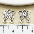 Antique silver butterfly charm pendant for DIY jewelry making with zinc alloy details - Antique Silver Double Loop Butterfly (22317)