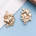 Christmas double bell charms in gold finish with decorative bow and textured reverse side - Christmas Bells / 17x25mm (18294)