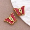 Par de dijes de mariposa en esmalte rojo con detalle de ojo turco y borde dorado - Cuenta Mariposa Roja / 10x13x4mm