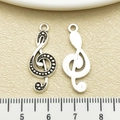 Antique silver treble clef music note charms with textured front and smooth back finish - Antique Silver Treble Clef (22274)