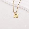 Detailed close-up of a gold H-letter pendant on a box chain with a polished metallic finish - Letter H (BJGN0271) / Gold