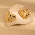 3D textured heart stud earrings in 18K gold plated stainless steel on stone props - Textured Heart Style (BJGE0832)