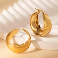 Polished gold stainless steel wide hoop earrings on a textured stone stand - Large Hoop Ring (BJGE0860) / Gold