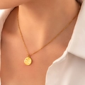 Minimalist gold titanium steel necklace featuring a round pendant with the Fu character - Fu Character Necklace