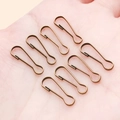 Eight small antique bronze gourd shape spring hooks on a palm for DIY jewelry making - 6x16mm / Antique Bronze