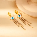Orecchini dorati con malocchio, catenine pendenti e dettagli in cristallo blu - Stile Malocchio con Nappa Grande (0512)