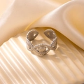 Adjustable silver titanium steel ring featuring an embossed evil eye and bead pattern - Evil Eye Style (#0463) / Silver