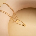 Double-layered 18K gold plated necklace featuring an 18K heart and letter B charm pendant - Double Layer Letter B