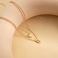 Minimalist double layer gold necklace featuring heart charm and letter C pendant - Double Layer Letter C