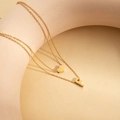 18K gold plated stainless steel layered necklace featuring a heart and F letter pendant - Letter F