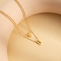 Double layered gold titanium necklace with heart pendant and letter G charm for women - Letter G