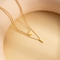 Elegant gold double-layer necklace with heart and rectangular pendant charms - Letter I