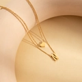 Double-layered gold stainless steel necklace with heart pendant and letter N charm - Letter N