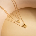 Gold double-layered stainless steel necklace featuring heart and letter W pendants - Letter W