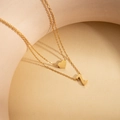 Double-layered 18K gold plated stainless steel necklace featuring letter L and heart charms - Letter Z