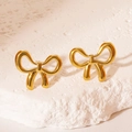 Polished gold stainless steel bow earrings set on white natural stone for women - Earrings
