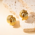 Minimalist geometric twisted knot gold stud earrings on beige stone background - Triple Thread Twisted Spiral Structure (BJGE0744)