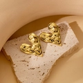 Golden heart-shaped stud earrings with hammered metal texture in a warm minimalist setting - Gold Irregular Hammered Heart Style (#0405)