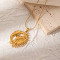 Detail of gold sun and moon pendant with snake chain on aesthetic stone background - Stars and Moon Embrace (JJN0058)