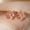 Pink enamel flower earrings with gold plating and pearl center on a stone display base - Pink Flower (#0989)