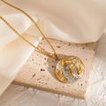 Detailed shot of bicolor floral relief pendant with zircon on a gold bead chain - Circular Flower Single Rhinestone (JJN0176)