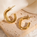 Chunky gold U-shaped hoop earrings with a high-polished finish on a textured base - Chunky U-Shaped Hoop (#1222)