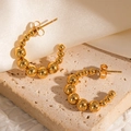 Chic 18k gold plated C-shaped beaded hoop earrings on a minimalist stone background - Gradient Sized Bead C-Shaped Hoop (#1230)