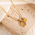 Detailed view of gold snake chain with polished round tag and khaki cat-eye stone pendant - Cat's Eye and Round Plate Style (JJN0221)