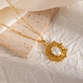 Detailed close-up of 18K gold-plated necklace with oval pearl pendant in baroque frame - Baroque Pleated Border Style (JJN0087)