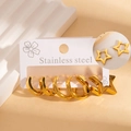 Elegant gold stainless steel hoop and star earring set on minimalist display - Star and Round Hoop Set (#1259)