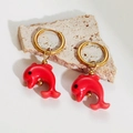 Detail of red enamel dolphin drop earrings on minimalist gold hoops and stone base - Red Dolphin
